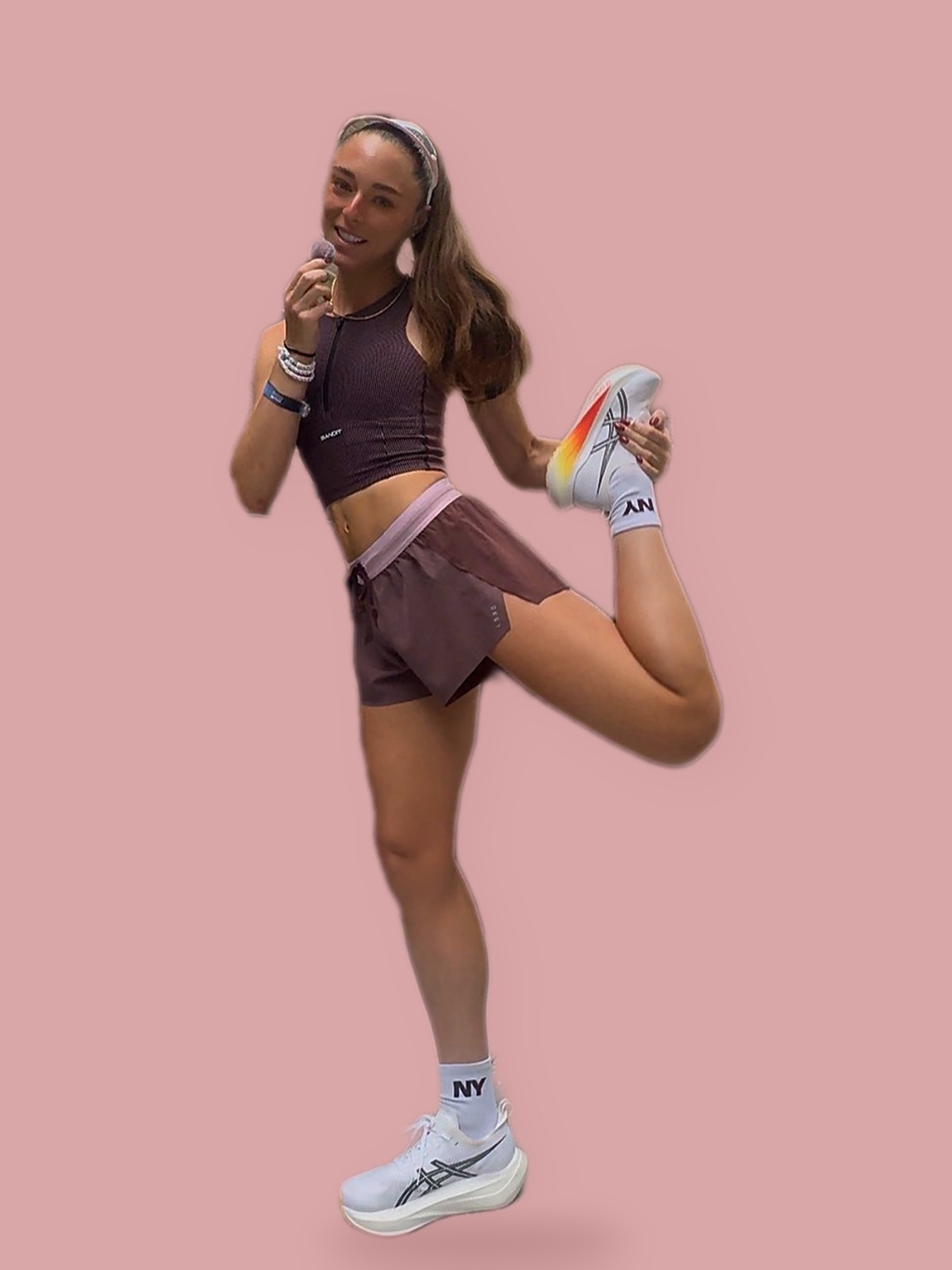 Holding up a shoe sole on blush